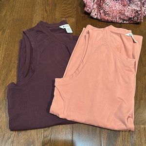 Two Athleta scoop neck sleeveless tops /tanks